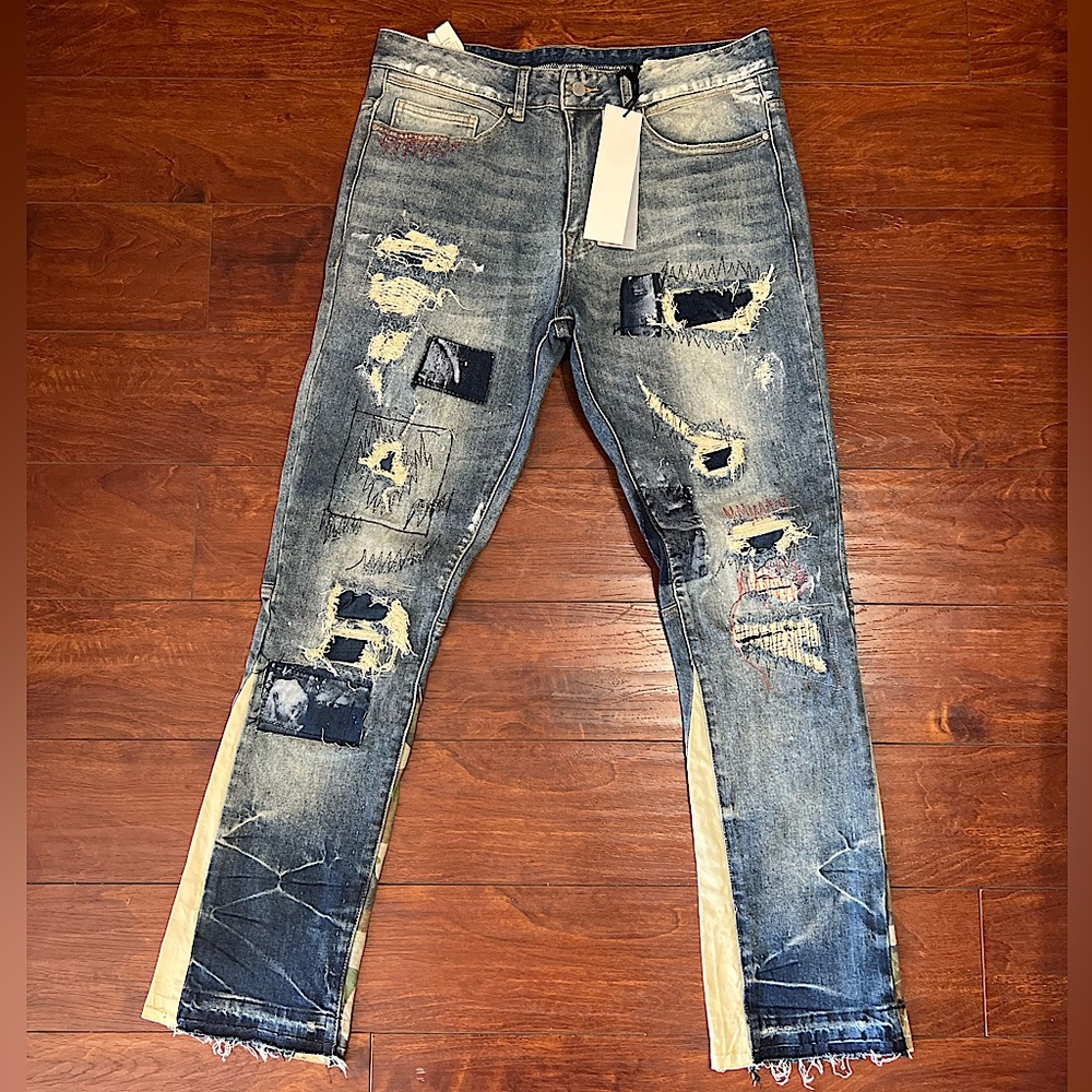 COPY - Size 34 distressed blue jeans flared